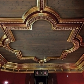 In the halls of Palace of the Grand Dukes of Lithuania – bright-colored walls and gilded ceiling